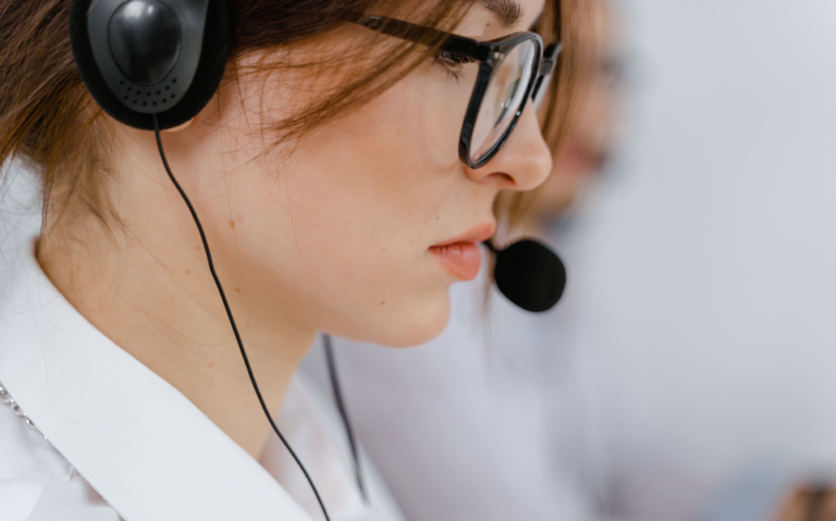 Marketing specialist on a headset managing med spa lead generation